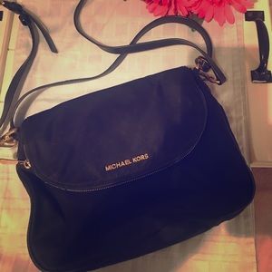 Michael Kors crossbody handbag.